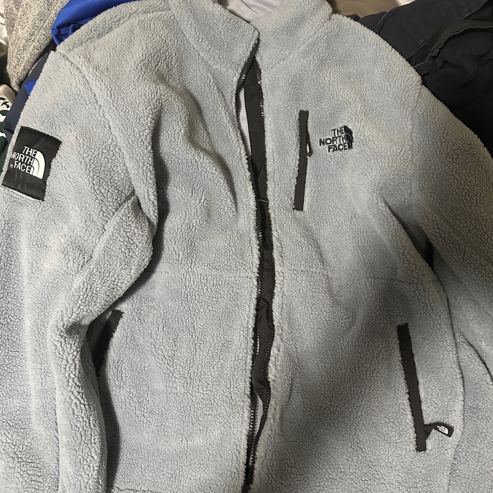 The North Face Light blue Sherpa Fleece Jacket with Black Logo Patch